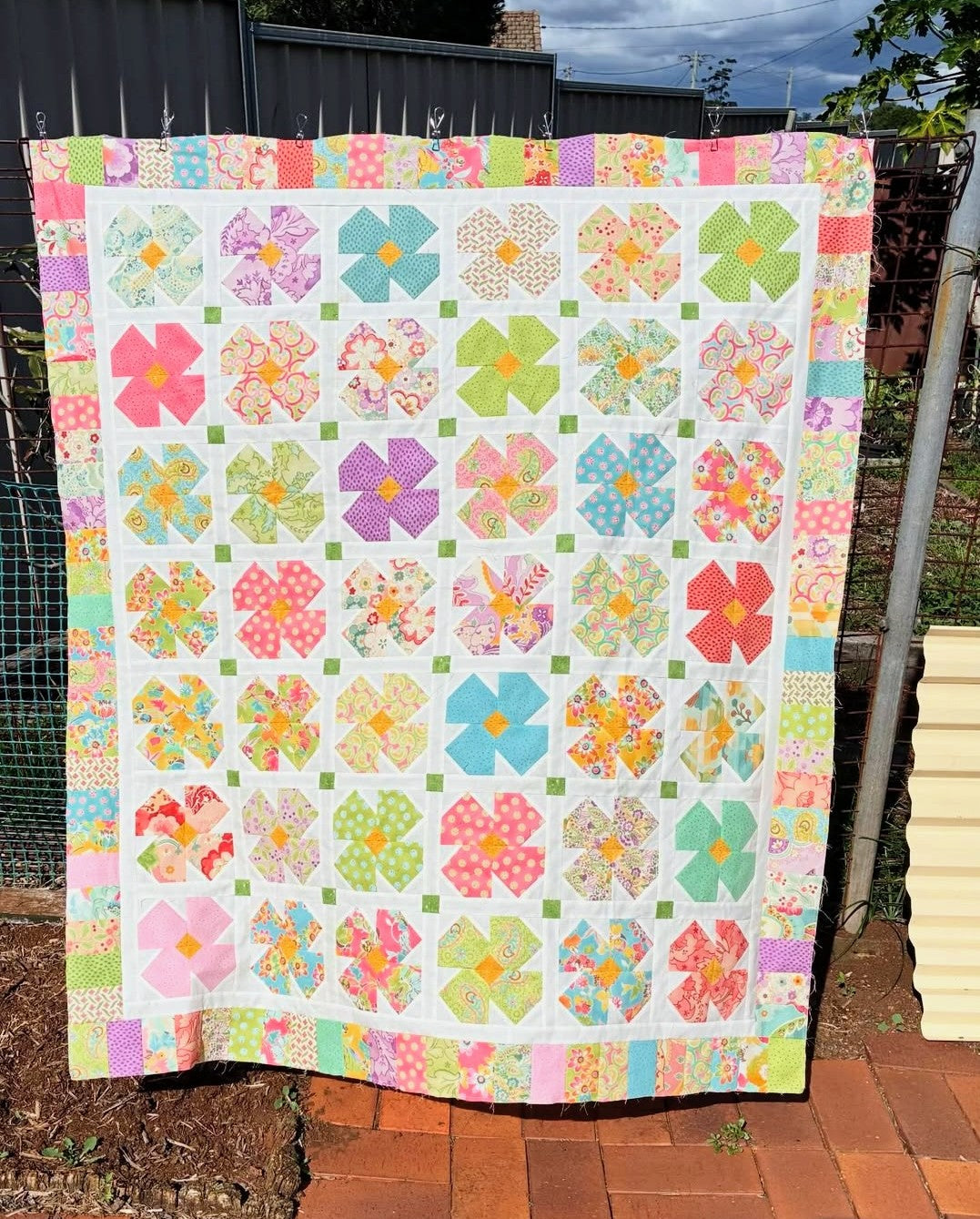 Petal Twist Quilt pattern by Thimbles and Needles