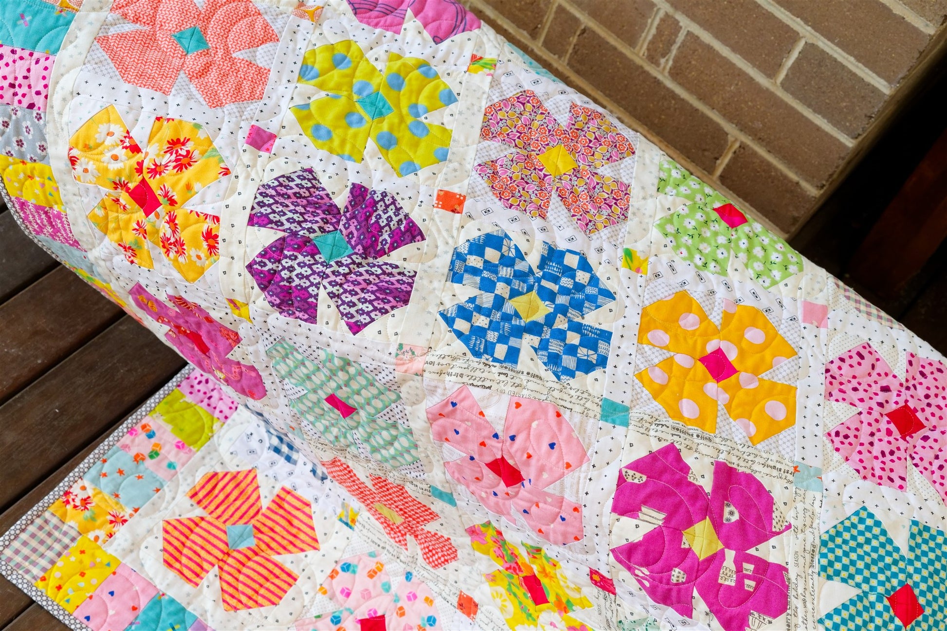 Petal Twist flower quilt pattern by Thimbles and Needles