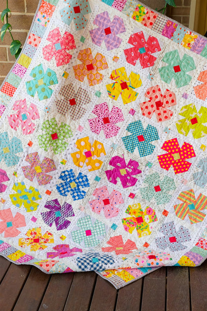 Petal Twist flower quilt pattern by Thimbles and Needles